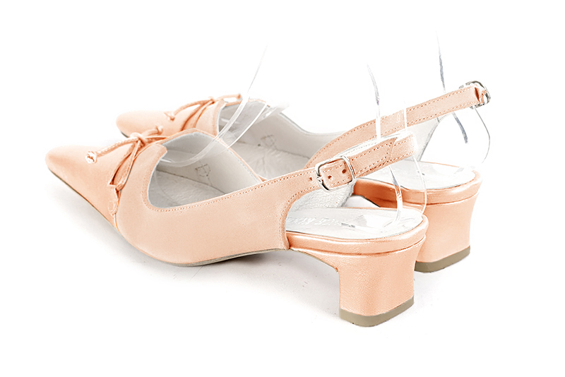 Powder pink women's open back shoes, with a knot. Tapered toe. Low kitten heels. Rear view - Florence KOOIJMAN